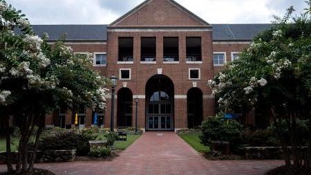 Exterior photo of Kenan Flagler Business School during the day.